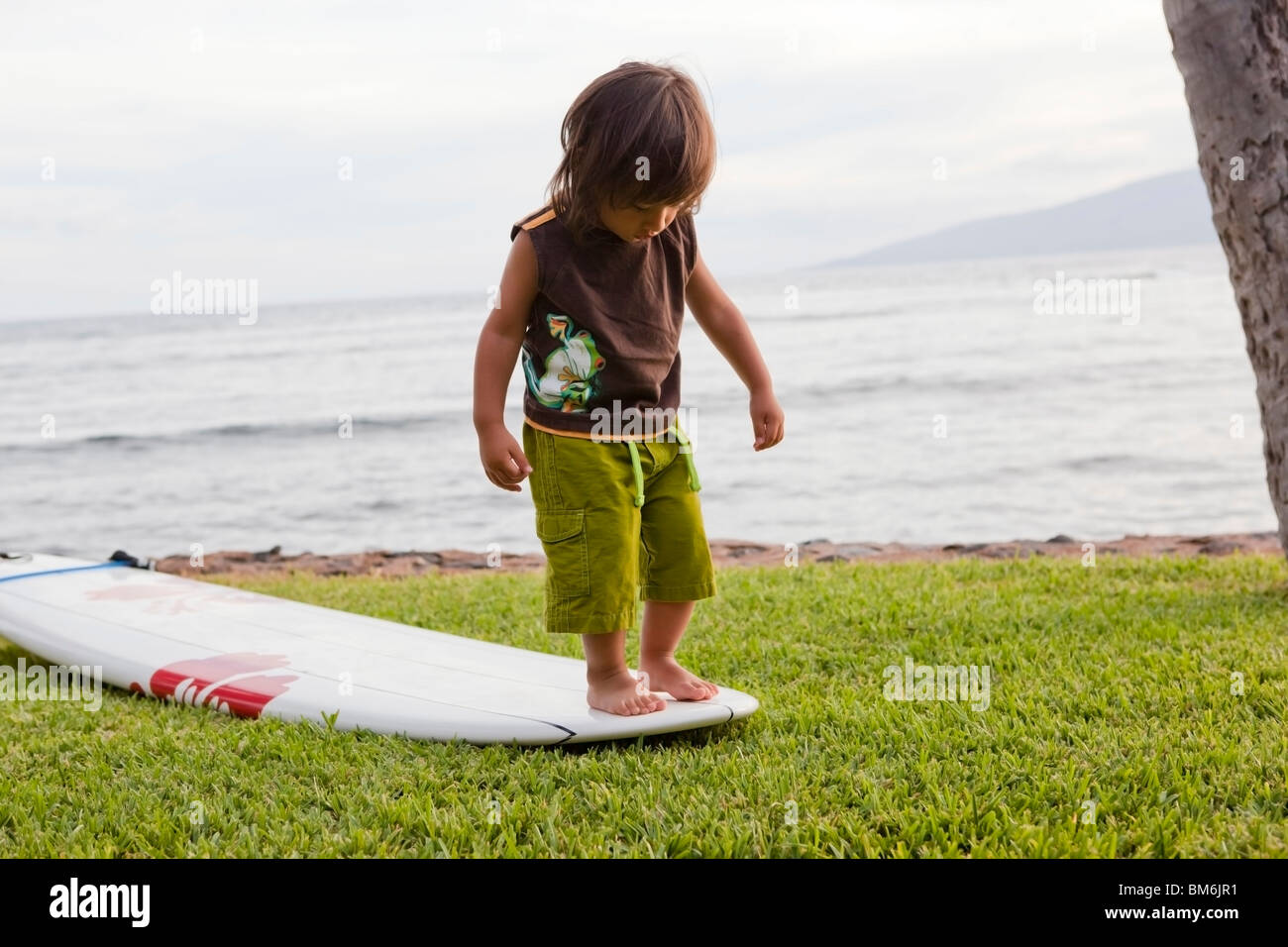 young boy ,hang ten surfboard Stock Photo - Alamy
