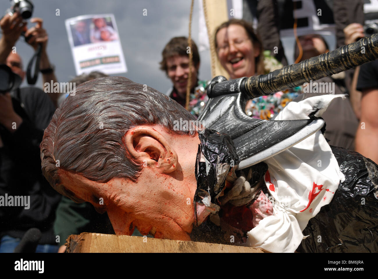 The effigy of Gordon Brown is beheaded in Parliament Square on May Day. Stock Photo