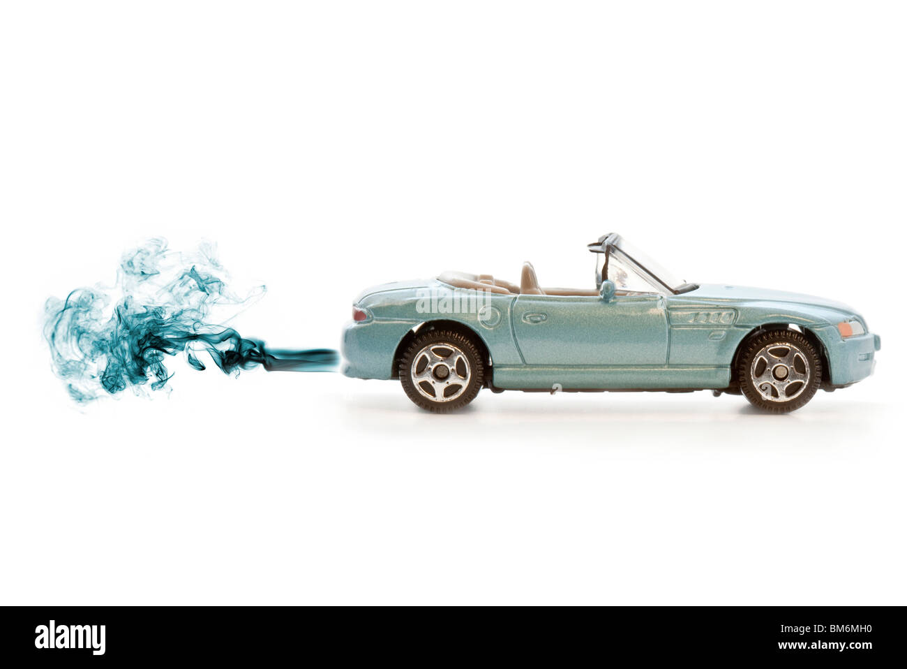 Toy car with smoking exhaust Stock Photo