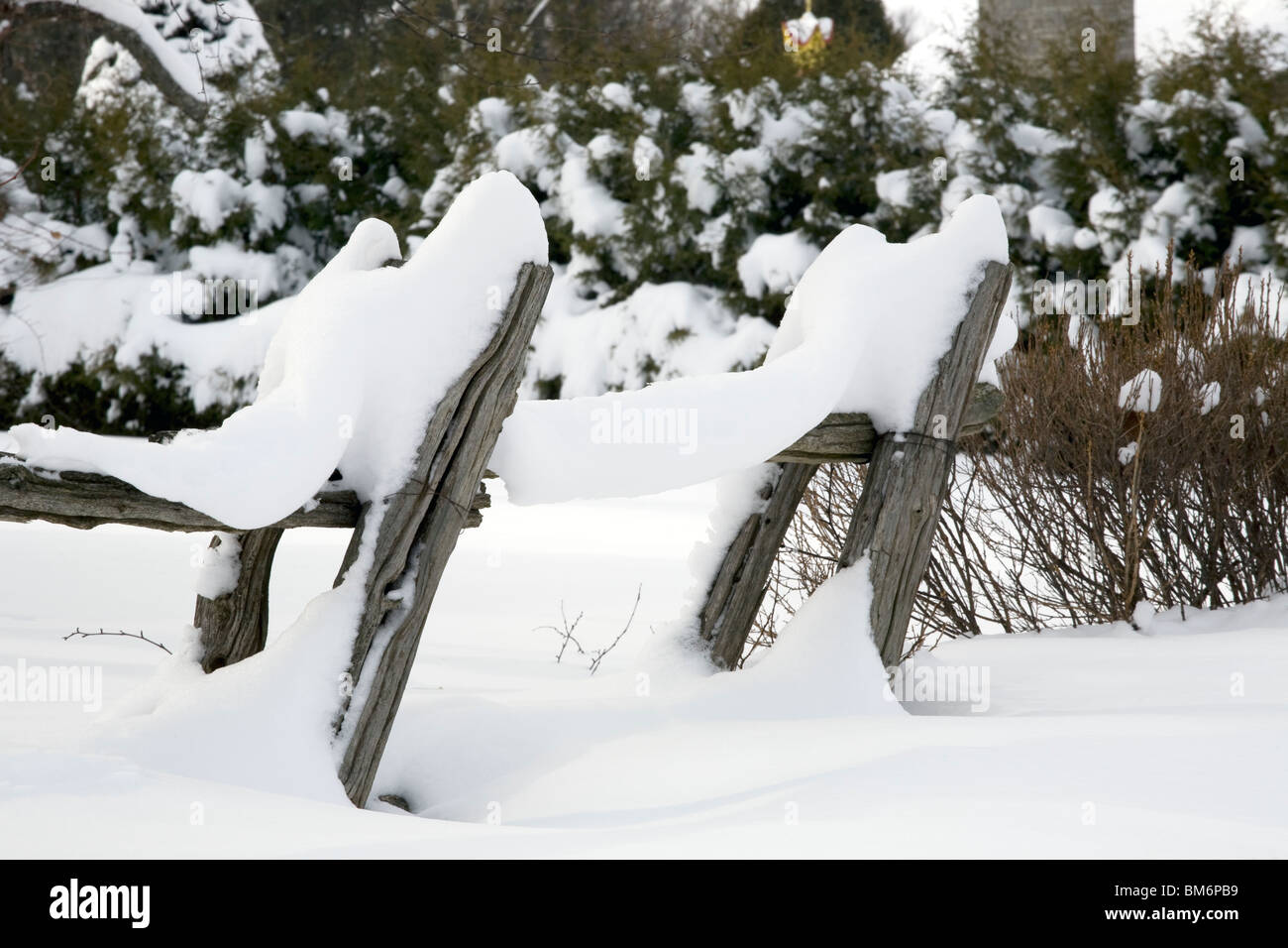 Old Wooden Fence Covered In Snow Stock Photo - Alamy
