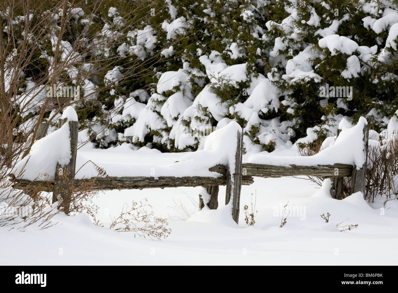 Old Wooden Fence Covered In Snow Stock Photo - Alamy