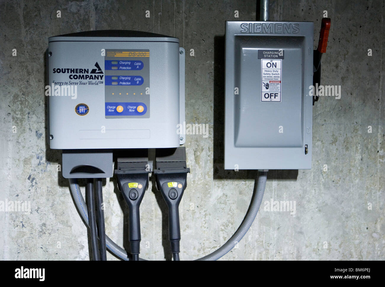 Electric vehicle charging plug hires stock photography and images Alamy