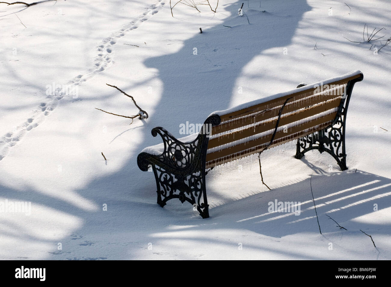 Park Bench Covered In Snow Stock Photo - Alamy