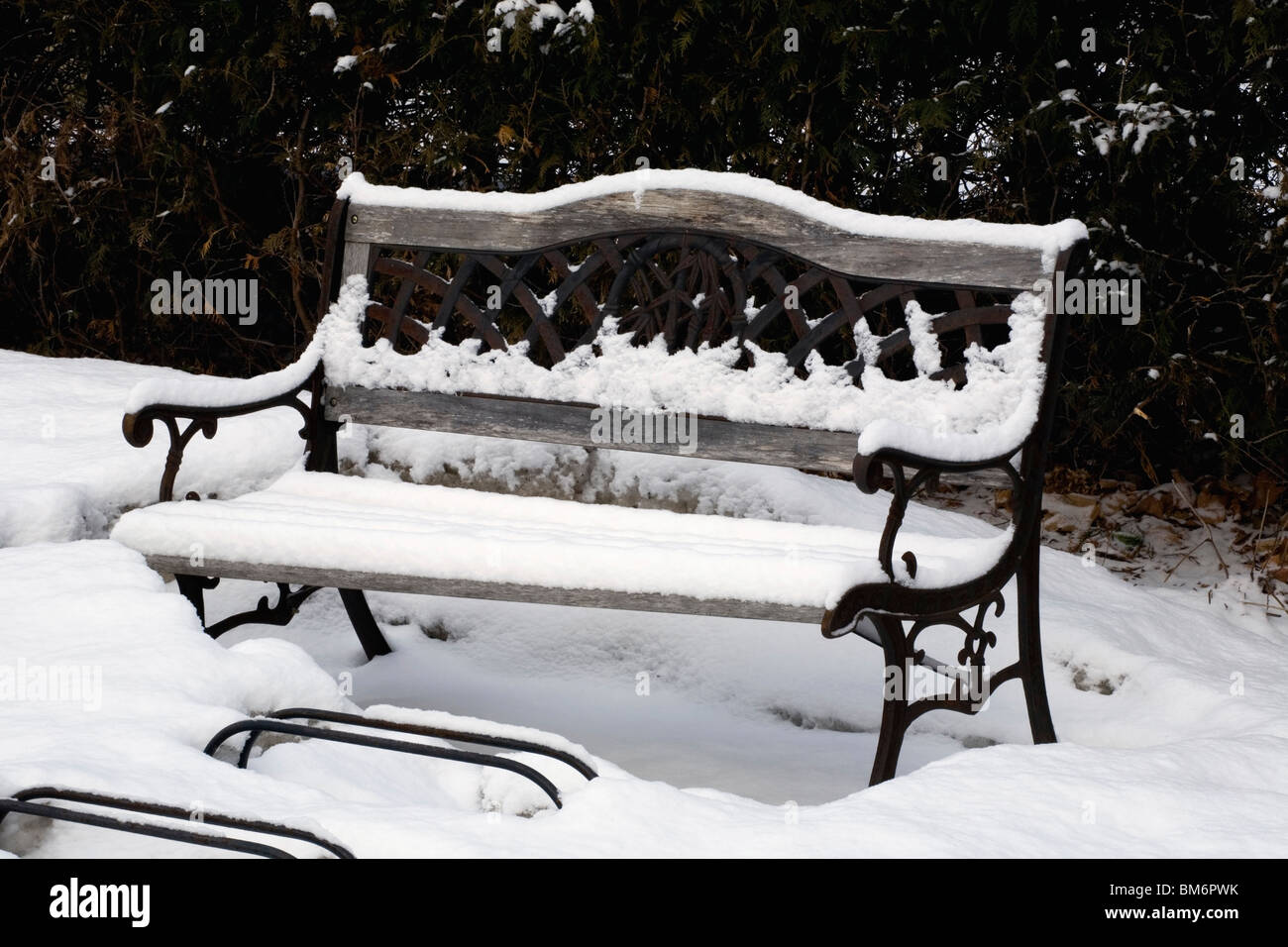 Park Bench Covered In Snow Stock Photo - Alamy