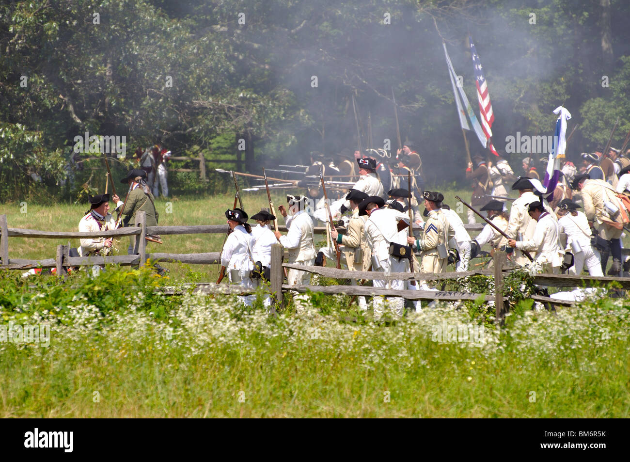 American patriots in battle costumed American Revolutionary War era (1770's) reenactment