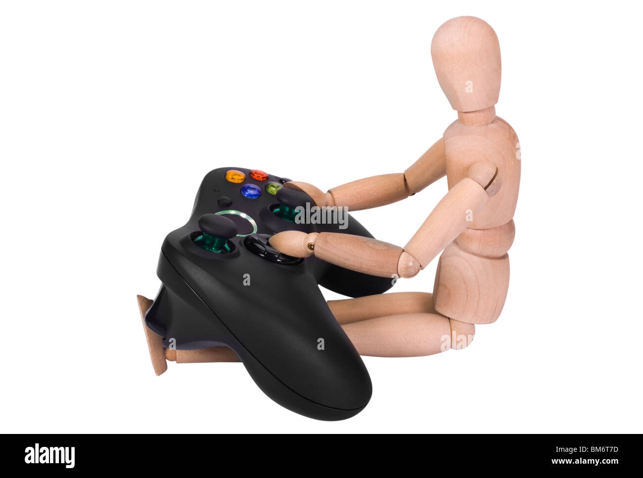Artist's figure with a video game controller Stock Photo - Alamy