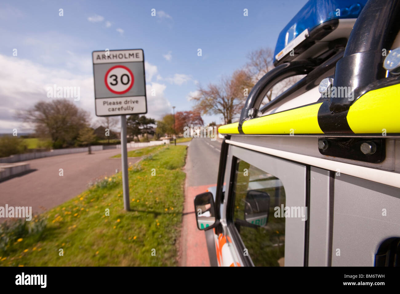 A Land Rover belonging to the Langdale/Ambleside Mountain Rescue Team driving under blue lights in an emergency situation. Stock Photo