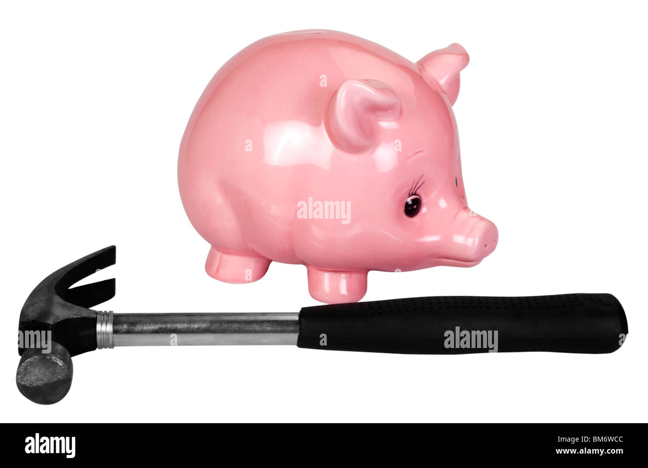 Close-up of a piggy bank and a hammer Stock Photo - Alamy