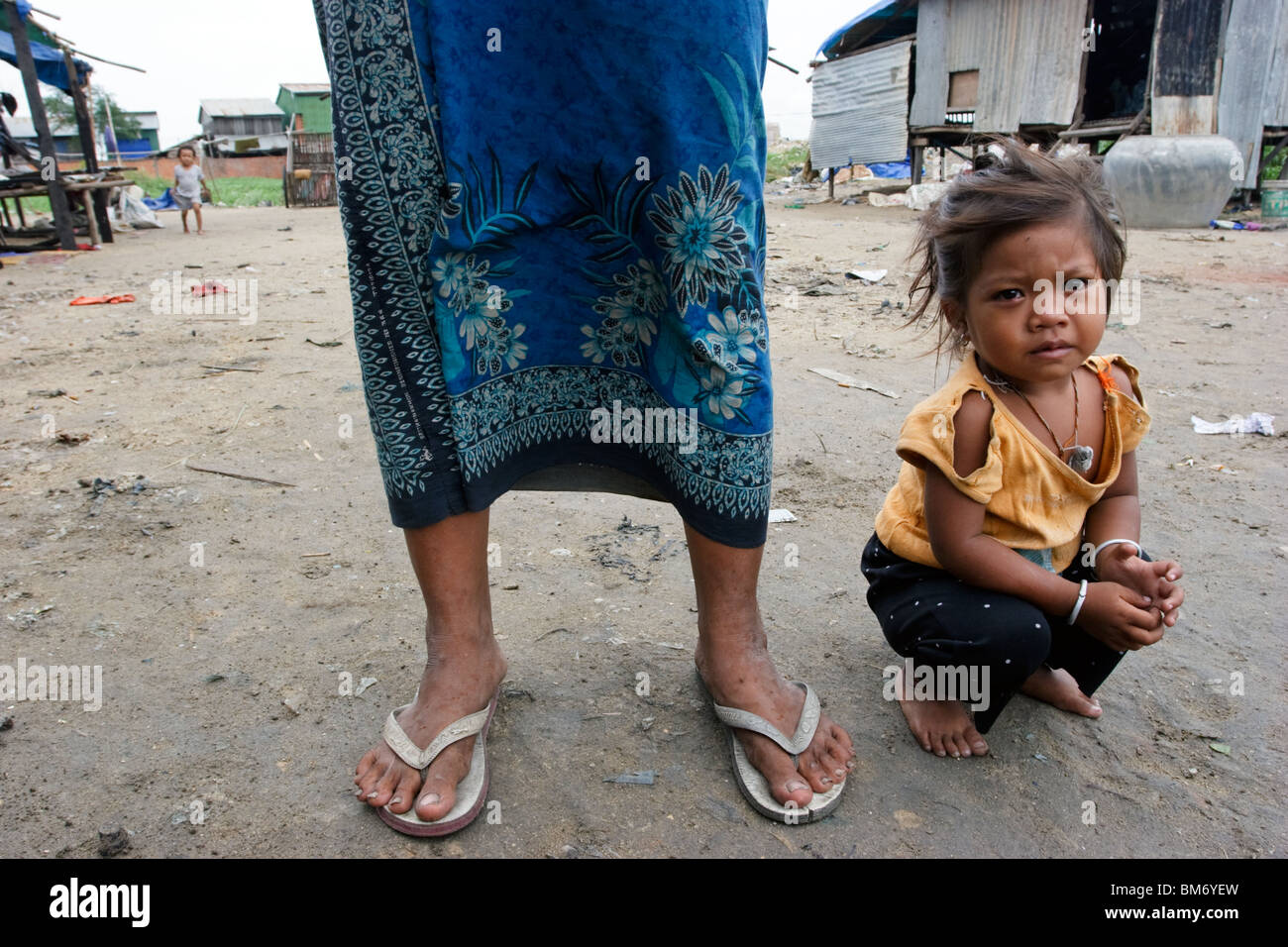 a young girl in the slum surrounding the garbage dump in Phnom Penh, Cambodia. Stock Photo