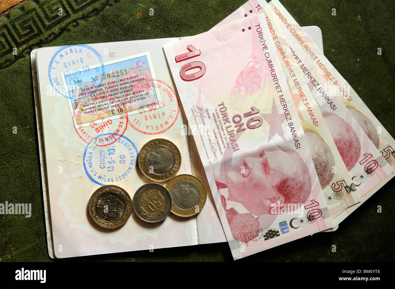 Turkish 90 day multiple entry visa in UK passport with entry and exit