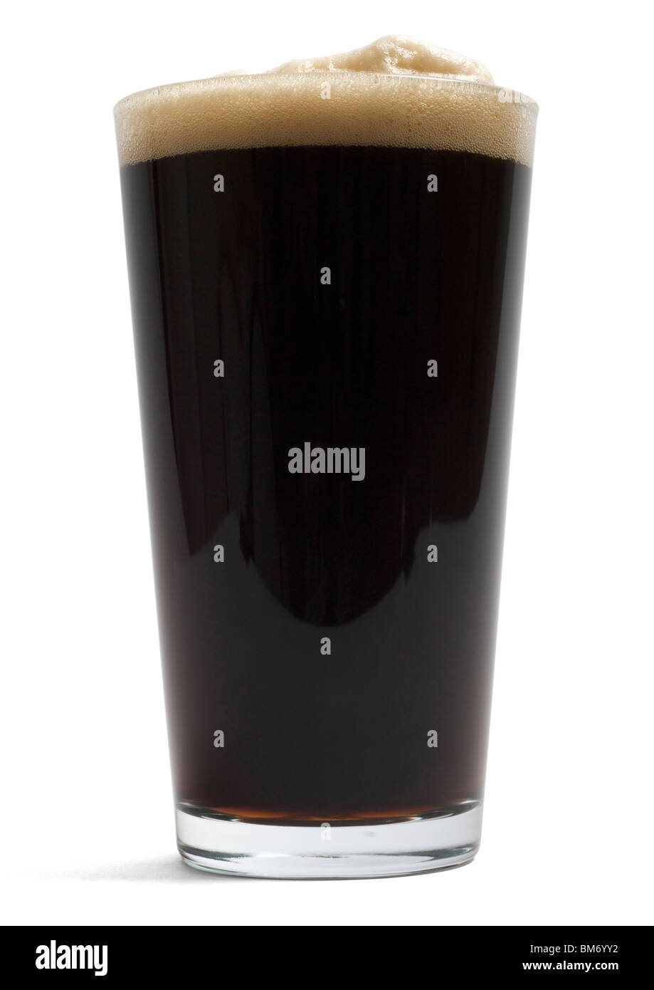 Pint glass of stout on white background Stock Photo - Alamy