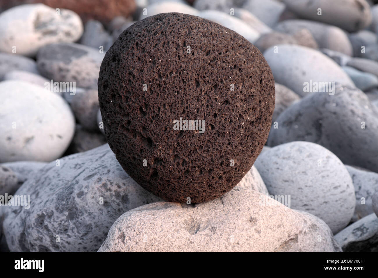 Close up of pebbles and stones on the beach at Playa San Juan Tenerife Canary Islands Spain Stock Photo