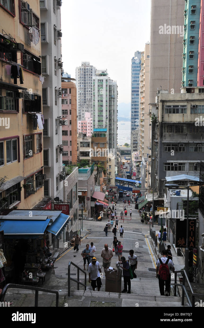Eastern Street, looking downhill from the ladder steps at the top, north towards Victoria Harbour, Sai Ying Pun, Hong Kong Stock Photo