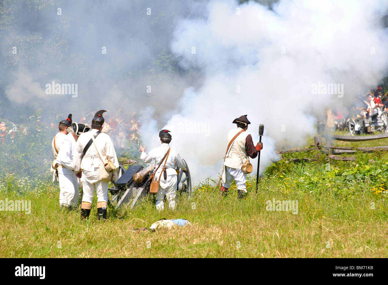 American patriots in battle costumed American Revolutionary War era (1770's) reenactment