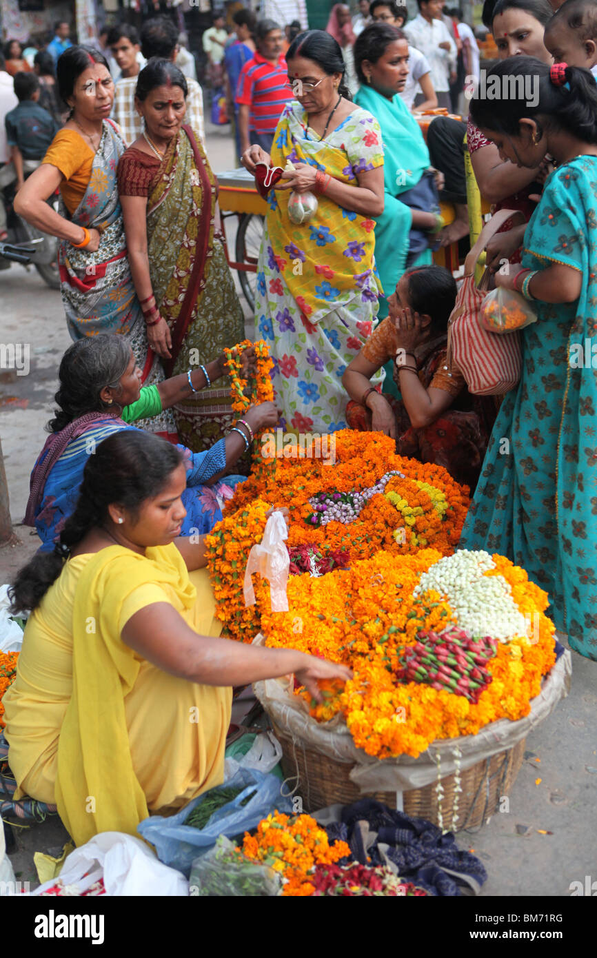 Indian women selling flowers during Diwali in Varanasi or Benares or Banaras, Uttar Pradesh, India. Stock Photo