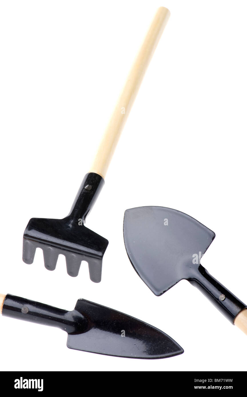 object on white - garden tool spade and rake Stock Photo
