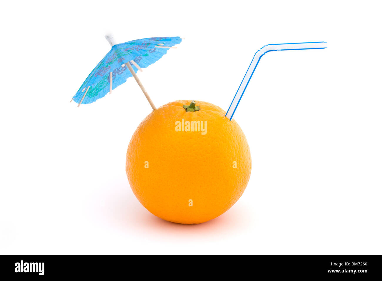 orange with straw and blue umbrella on a white background Stock Photo