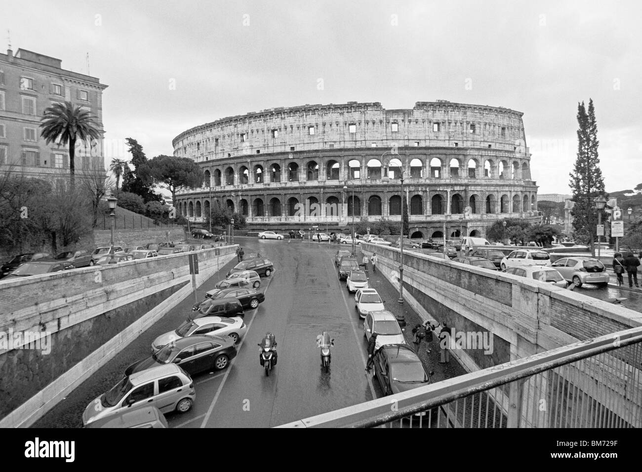 Rome, Italy, 30 January 2010 -- The colosseum, captured in black and white on Agfa APX 100 negative film, as seen from Via del F Stock Photo