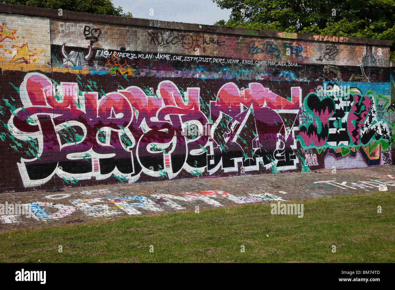 DPM [Hall of fame]  Legal graffiti wall around mains road, Dundee, Dundee City, UK Stock Photo