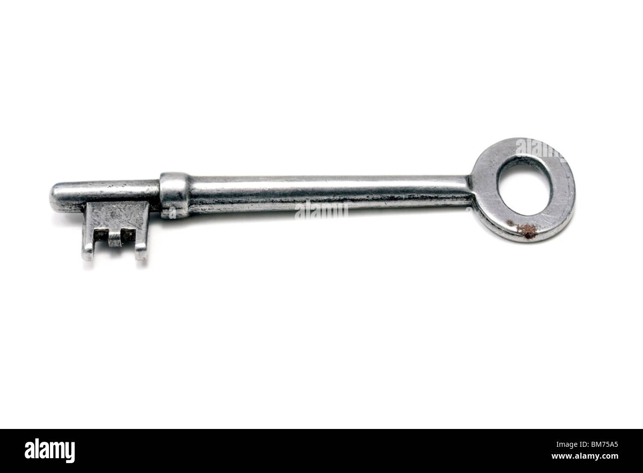 A old key isolated on white background Stock Photo - Alamy