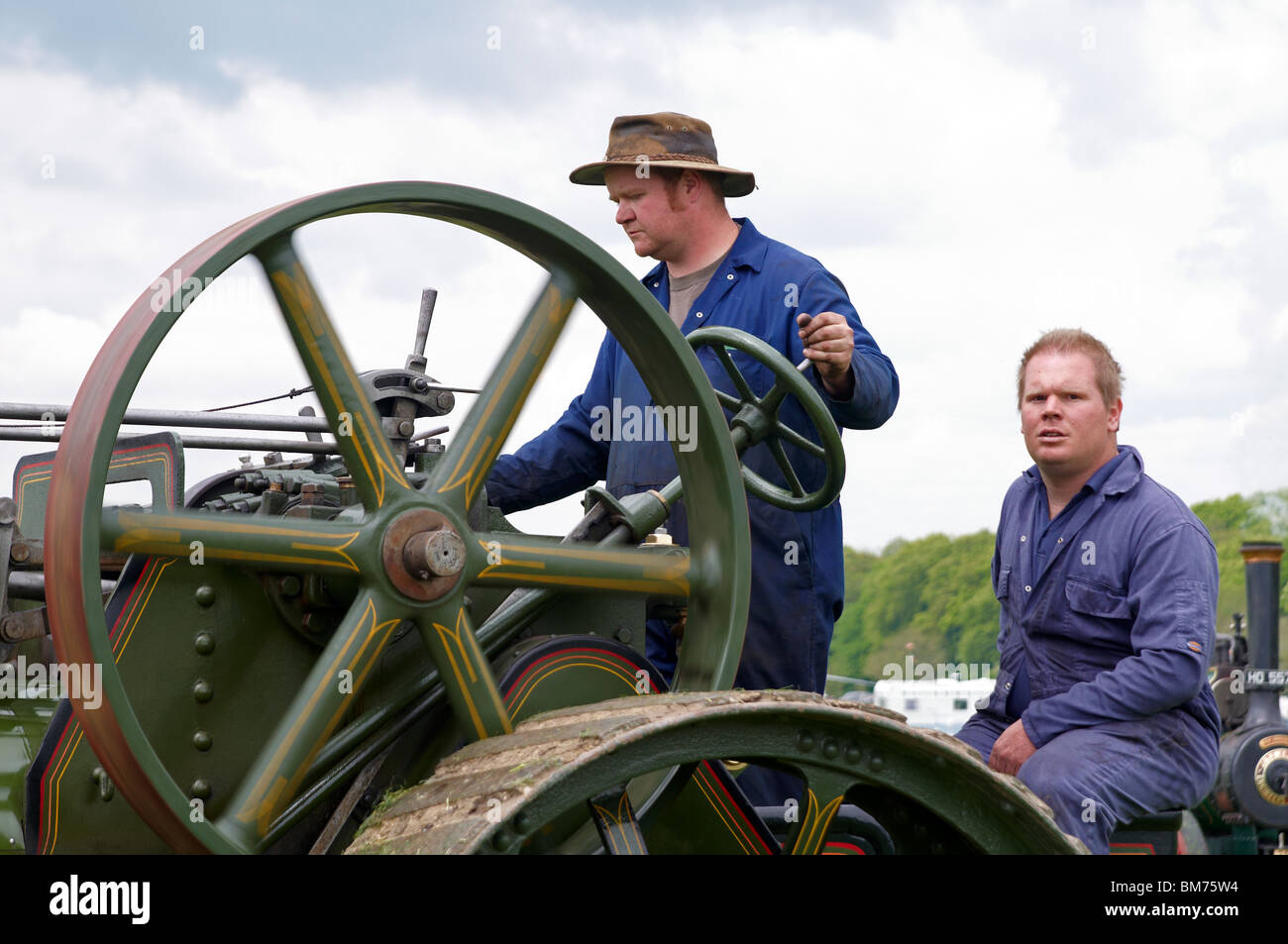 Traction engine crew at the Bill Targett Memorial Rally, near Winchester, Hampshire in May 2010 Stock Photo