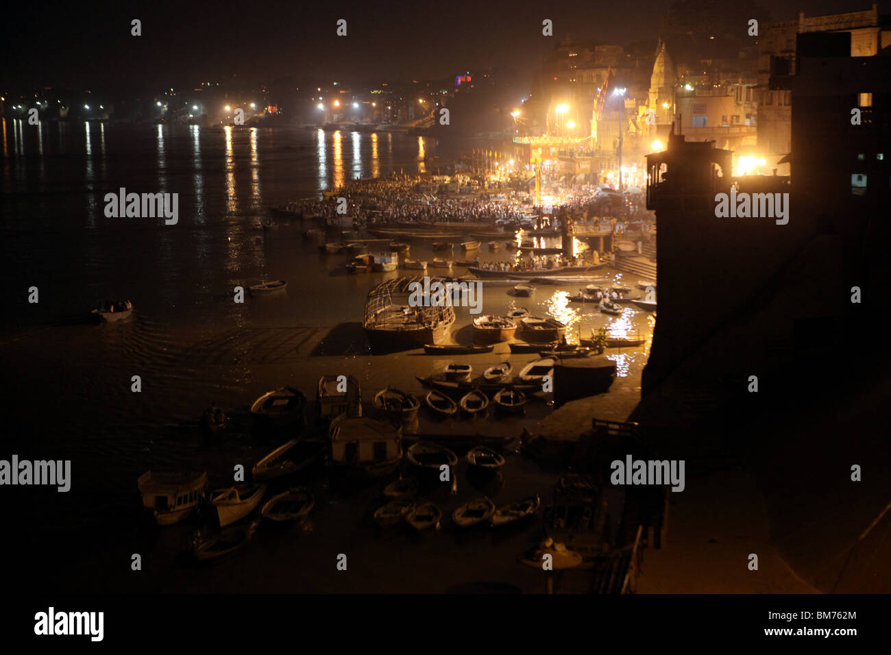 Night view of the ghats and riverside of The Ganges in Varanasi in India. Stock Photo