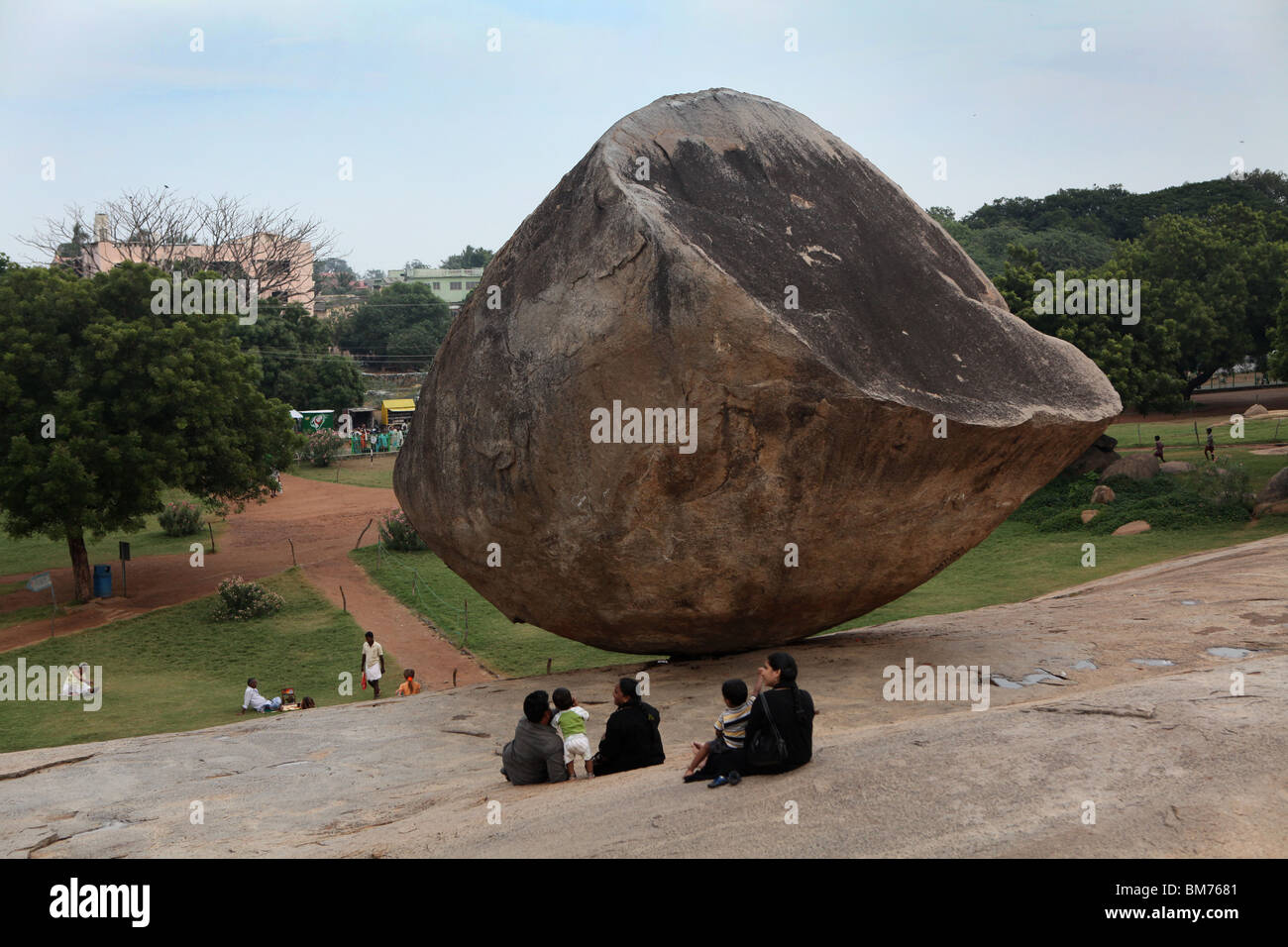 Krishnas Butter Ball, a huge gravity defying boulder at Mahabalipuram or Mamallapuram, Tamil Nadu state in India. Stock Photo