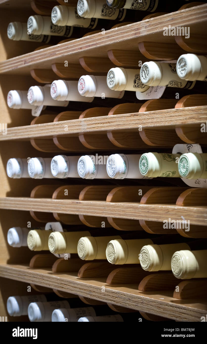 Bottles stacked in a Wine Cellar Stock Photo Alamy