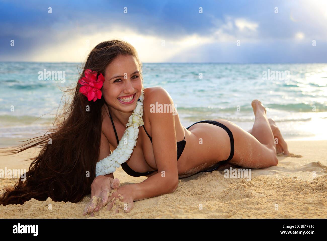 Woman young panty sweaters takes off lake beach backside gets along detail  20-30 years moving out beauty legs bikini-panties Stock Photo - Alamy