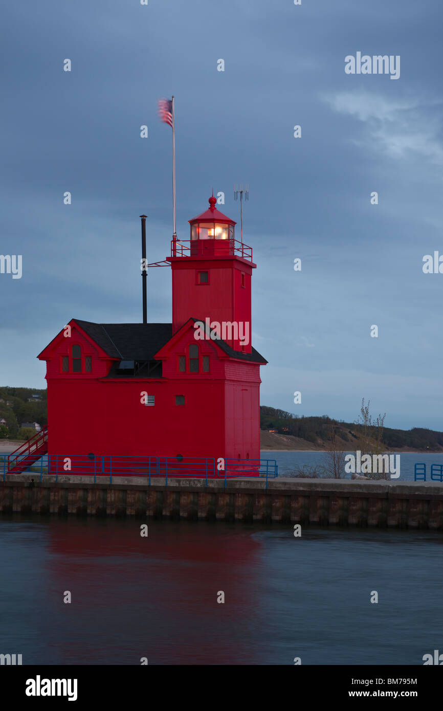 Tulip time festival Dutch Holland Michigan in USA Big Red lighthouse on Lake Michigan Ottawa Beach waterscape nobody low angle vertical hi-res Stock Photo