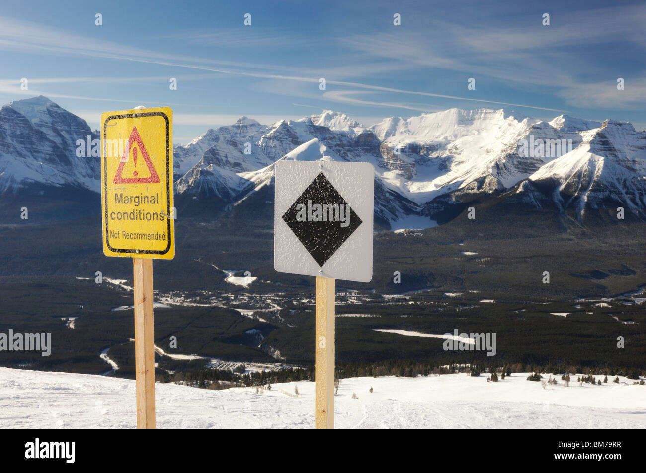Black diamond and marginal conditions signs at Lake Louise Ske Resort - Banff National Park, Alberta, Canada Stock Photo