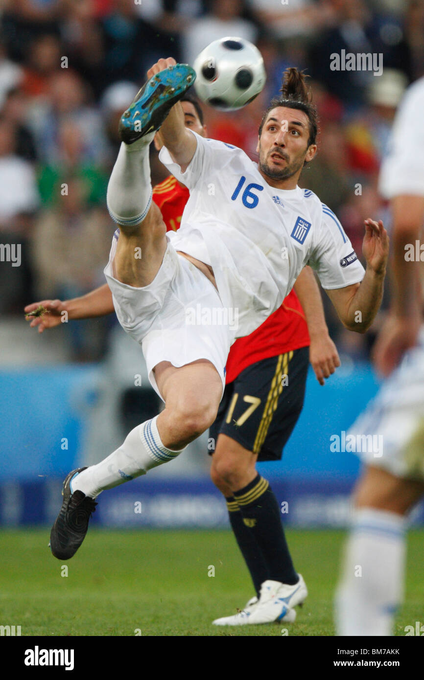 Sotiris Kyrgiakos of Greece kicks the ball during a UEFA Euro 2008 football match against Spain June 18, 2008. Stock Photo