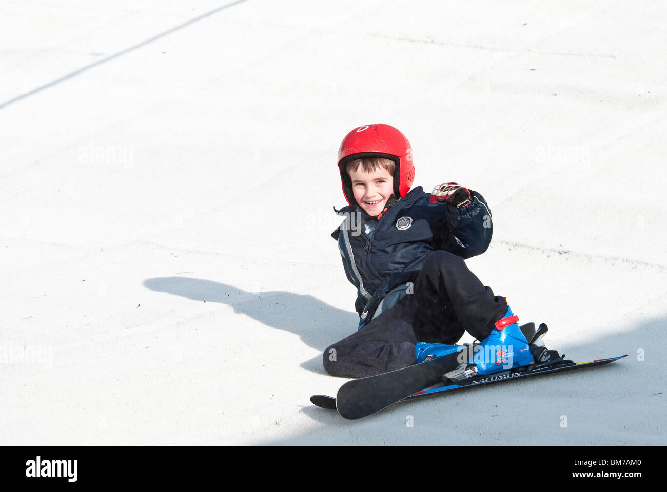 Child Learning to Ski at the Dry Ski Slope in Warmwell Dorset UK Stock