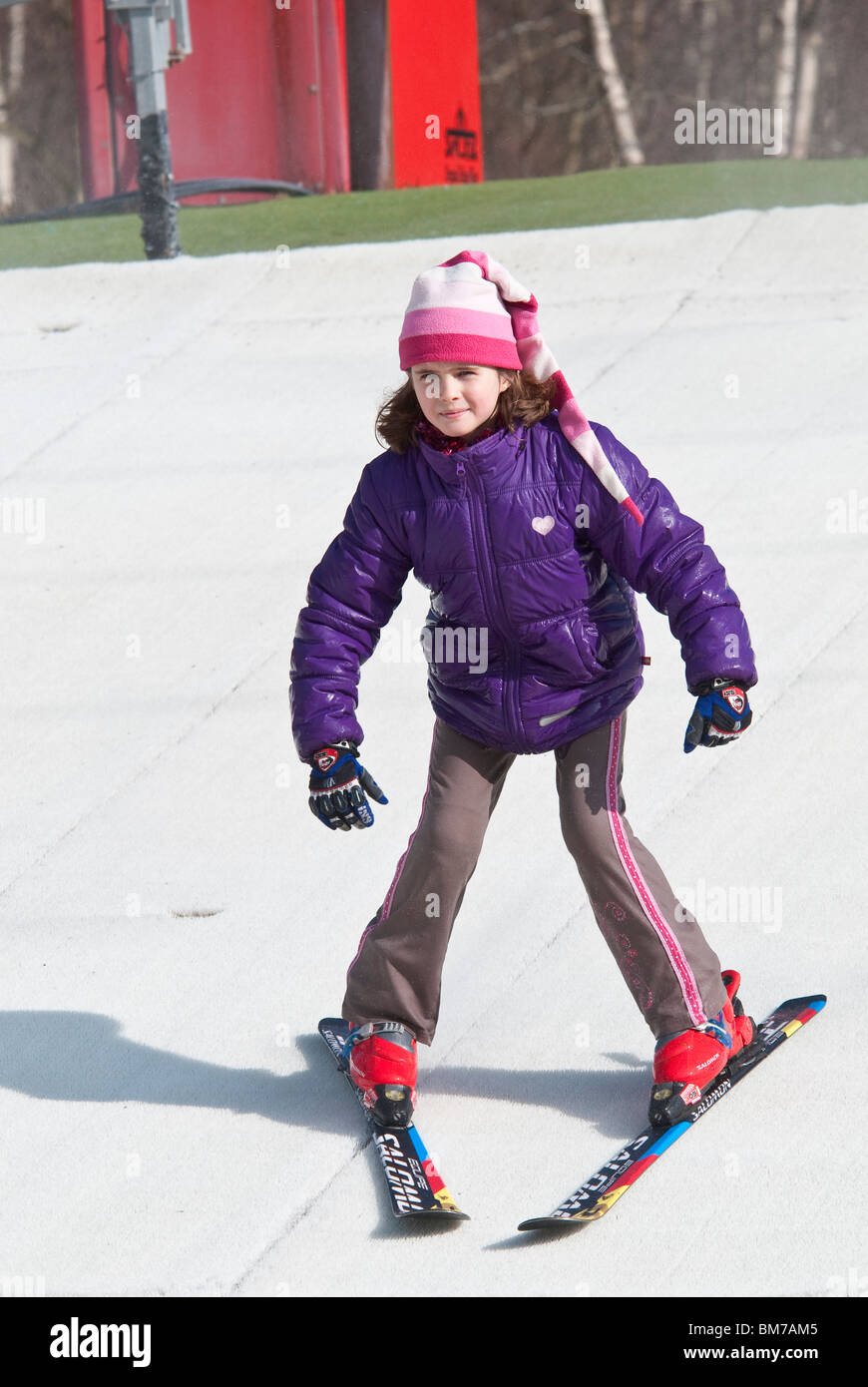 Child Learning to Ski at the Dry Ski Slope in Warmwell Dorset UK Stock Photo