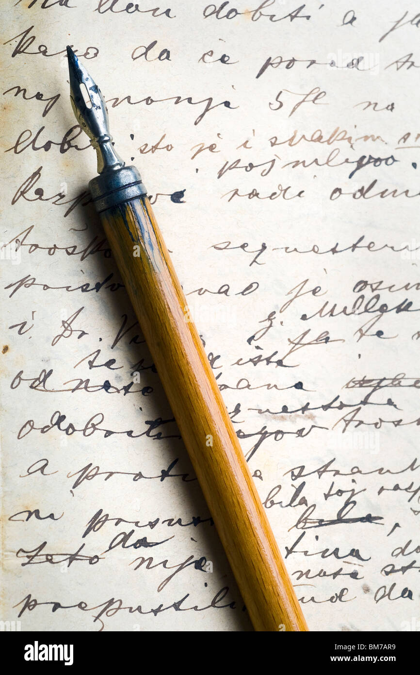 vintage pen on an old letter Stock Photo