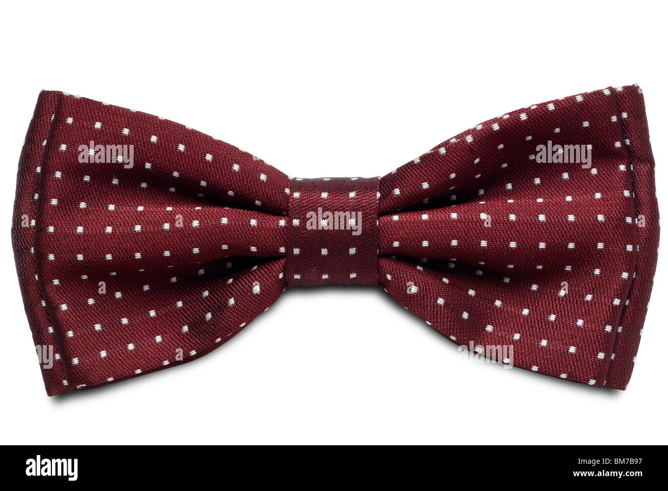 a red dotted bow-tie on white with clipping path Stock Photo