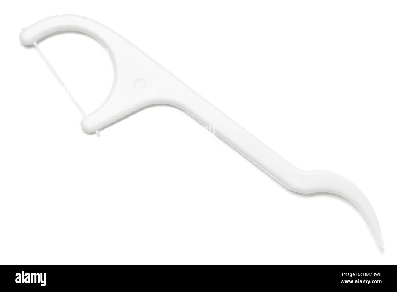 a white thootpick and floss on white - with clipping path Stock Photo