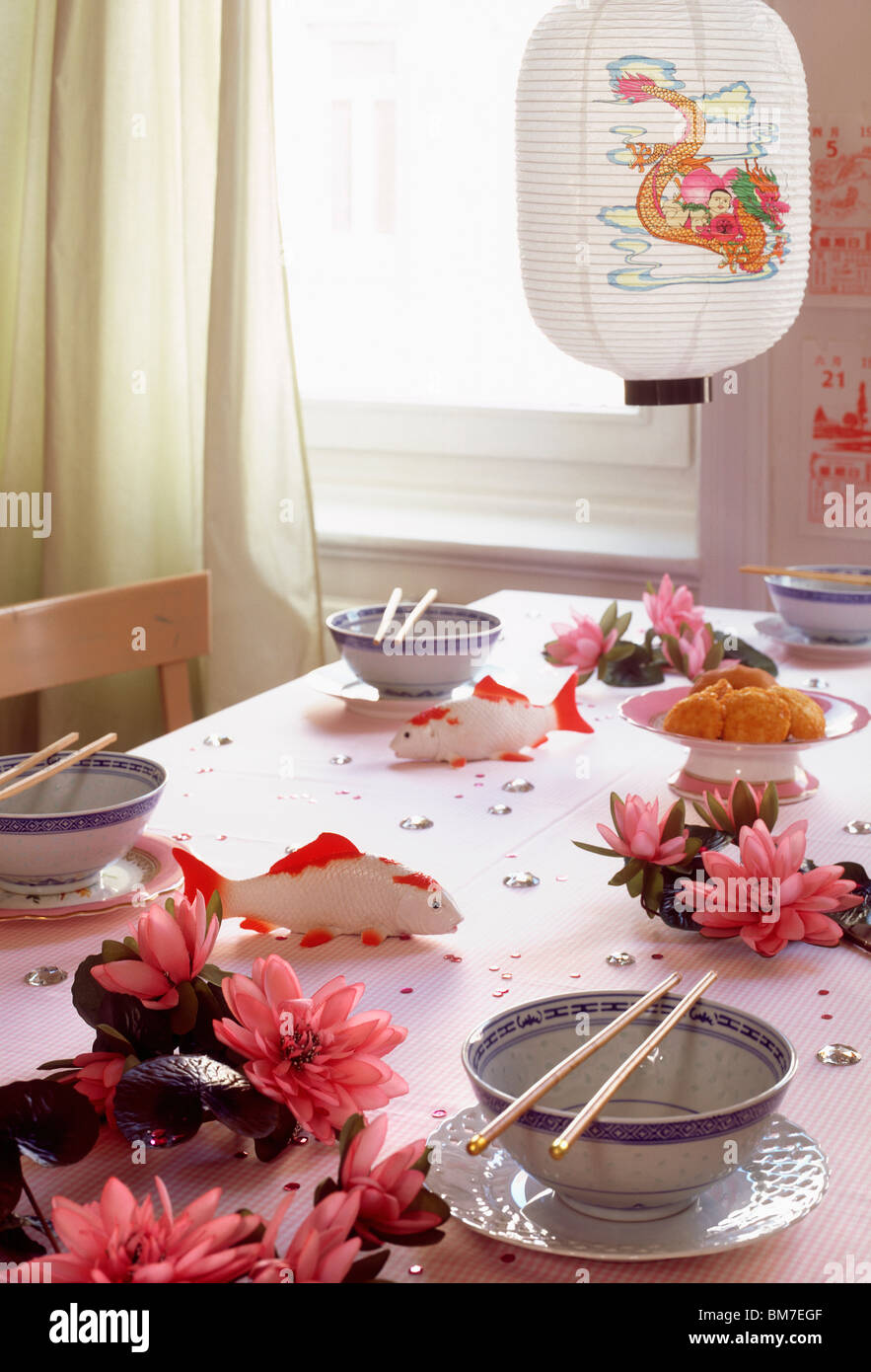 A table with place settings and Japanese decorations Stock Photo Alamy