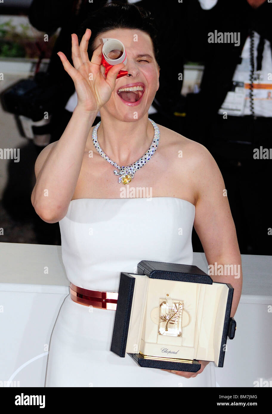 Juliette Binoche pose after winning the Best Actress award for her role in 'Certified Copy' during the 2010 Cannes film festival Stock Photo