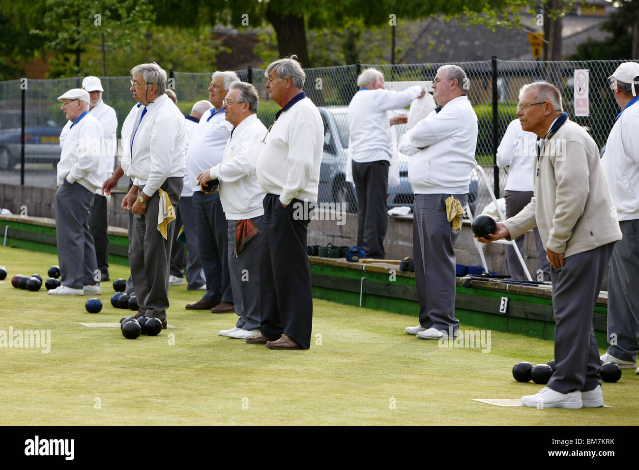 A Crown Green Bowls evening tournament - A nice sedate game for retired people but a very competitive sport played by all ages. Stock Photo