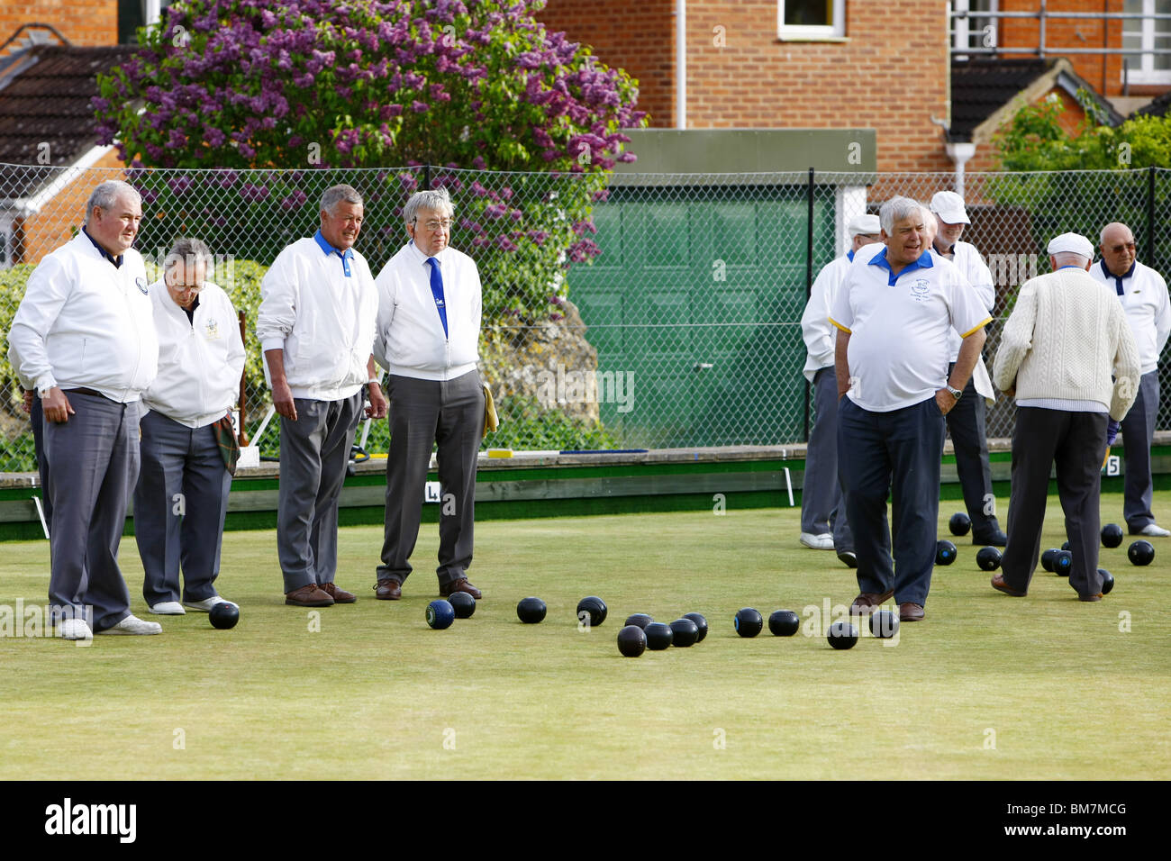 A Crown Green Bowls evening tournament - A nice sedate game for retired people but a very competitive sport played by all ages. Stock Photo