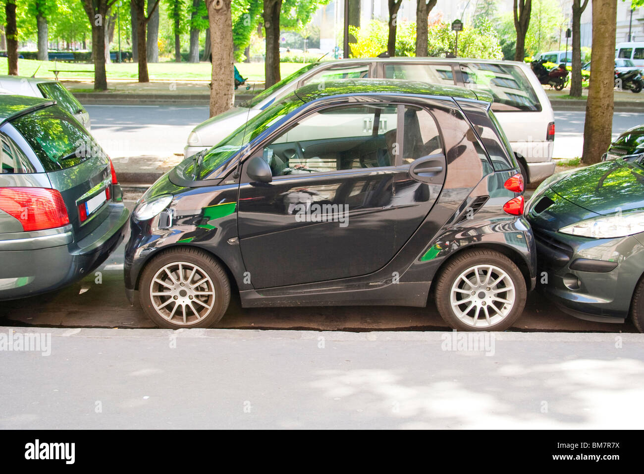 Smart car parked on a street in Paris, France Stock Photo