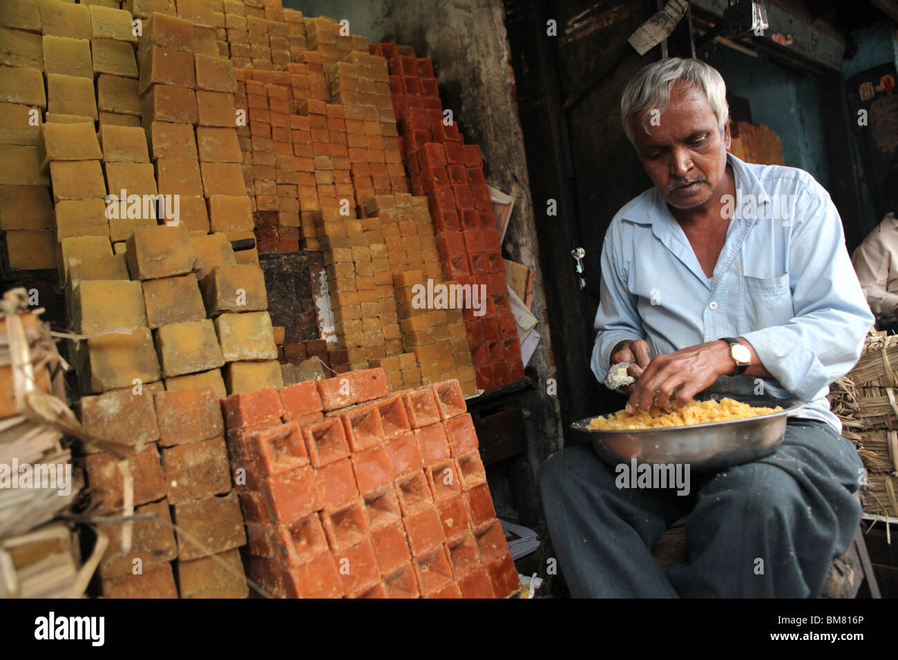 Jaggery or large sugar cubes on display in Devaraja market in Mysore, Karnataka, India. Stock Photo