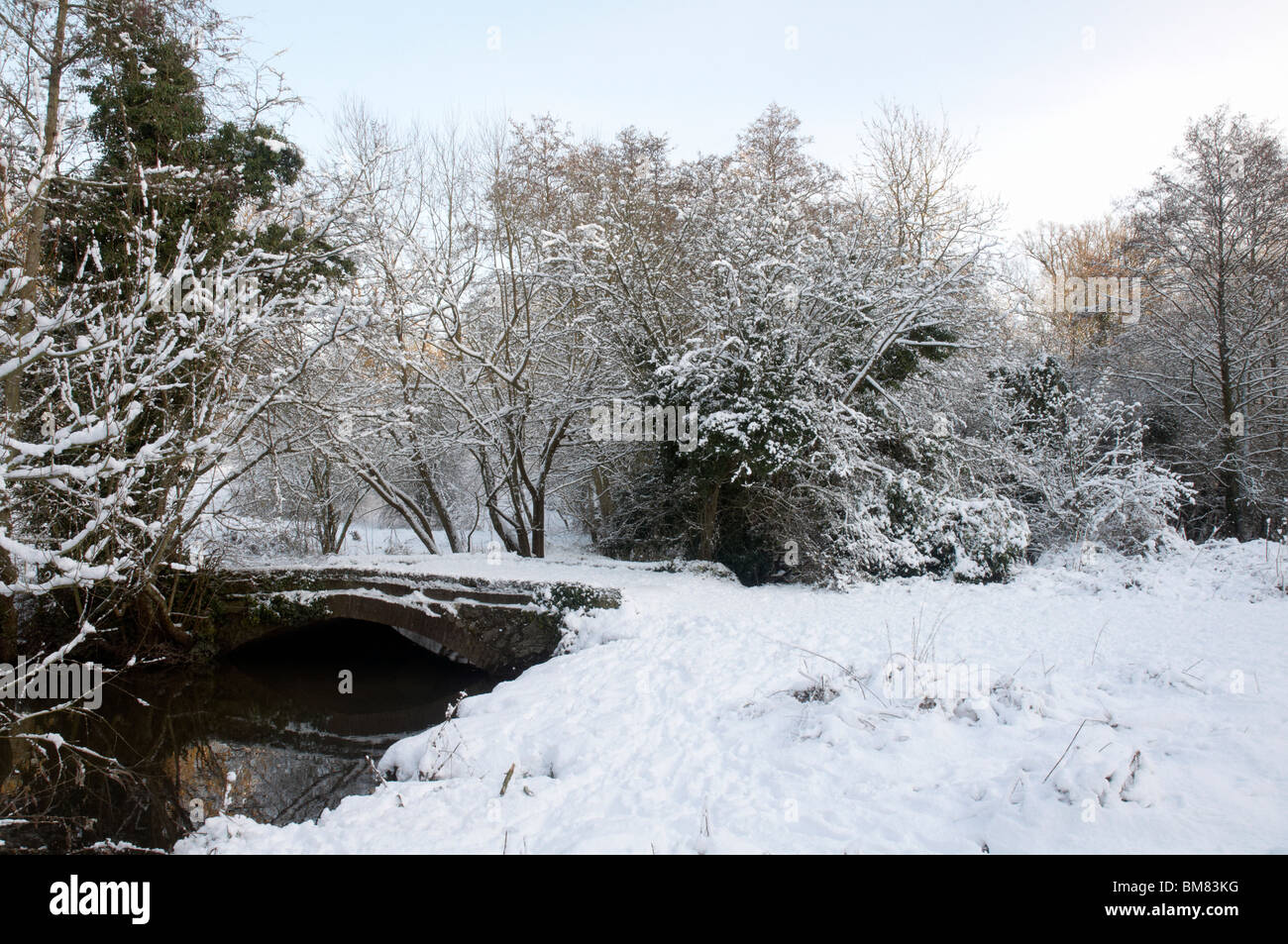 A footpath over a bridge covered in snow Stock Photo - Alamy