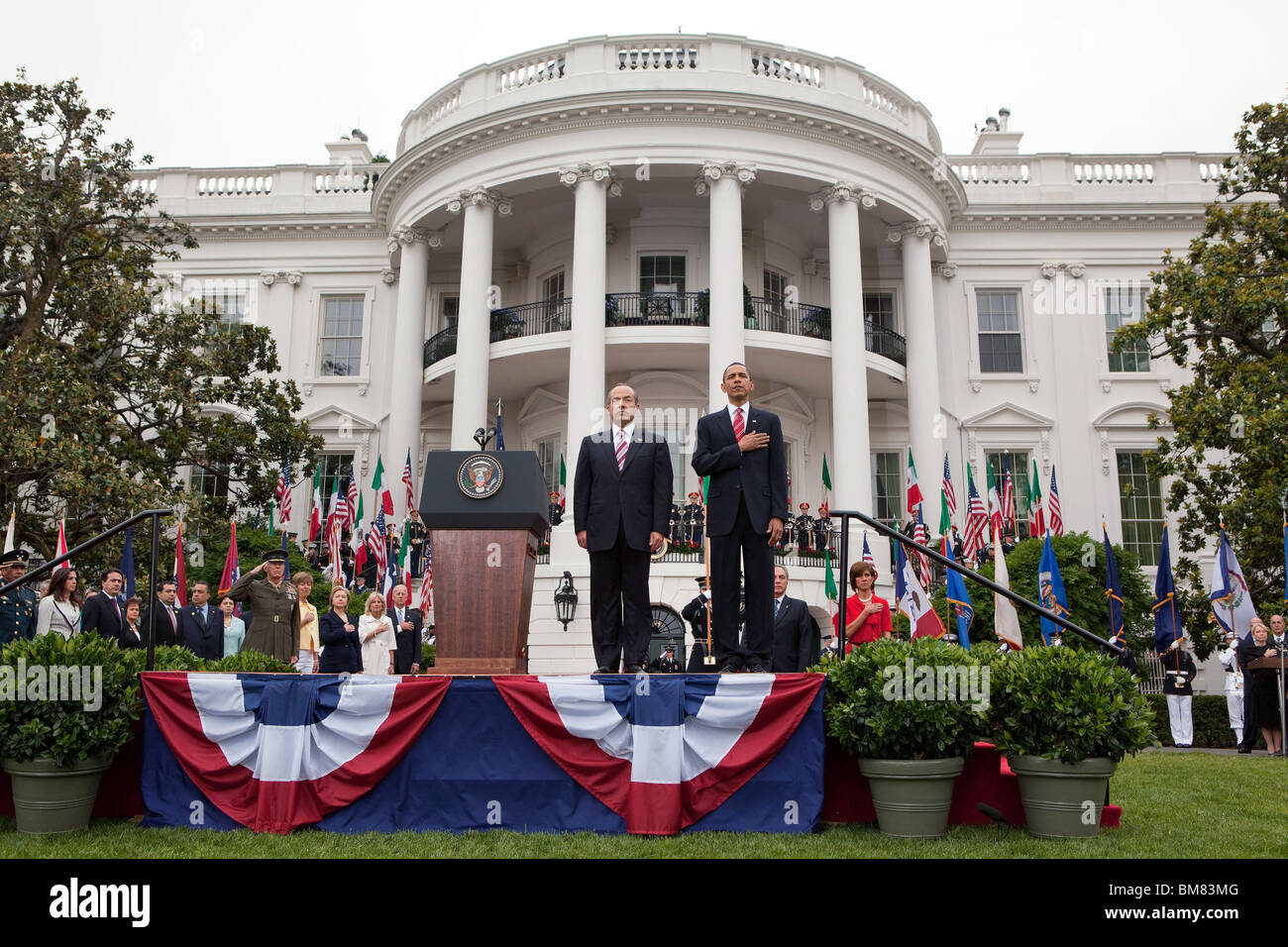 Barack Obama and President Felipe Calderón of Mexico stand together during the playing of the national anthem on the South Lawn Stock Photo