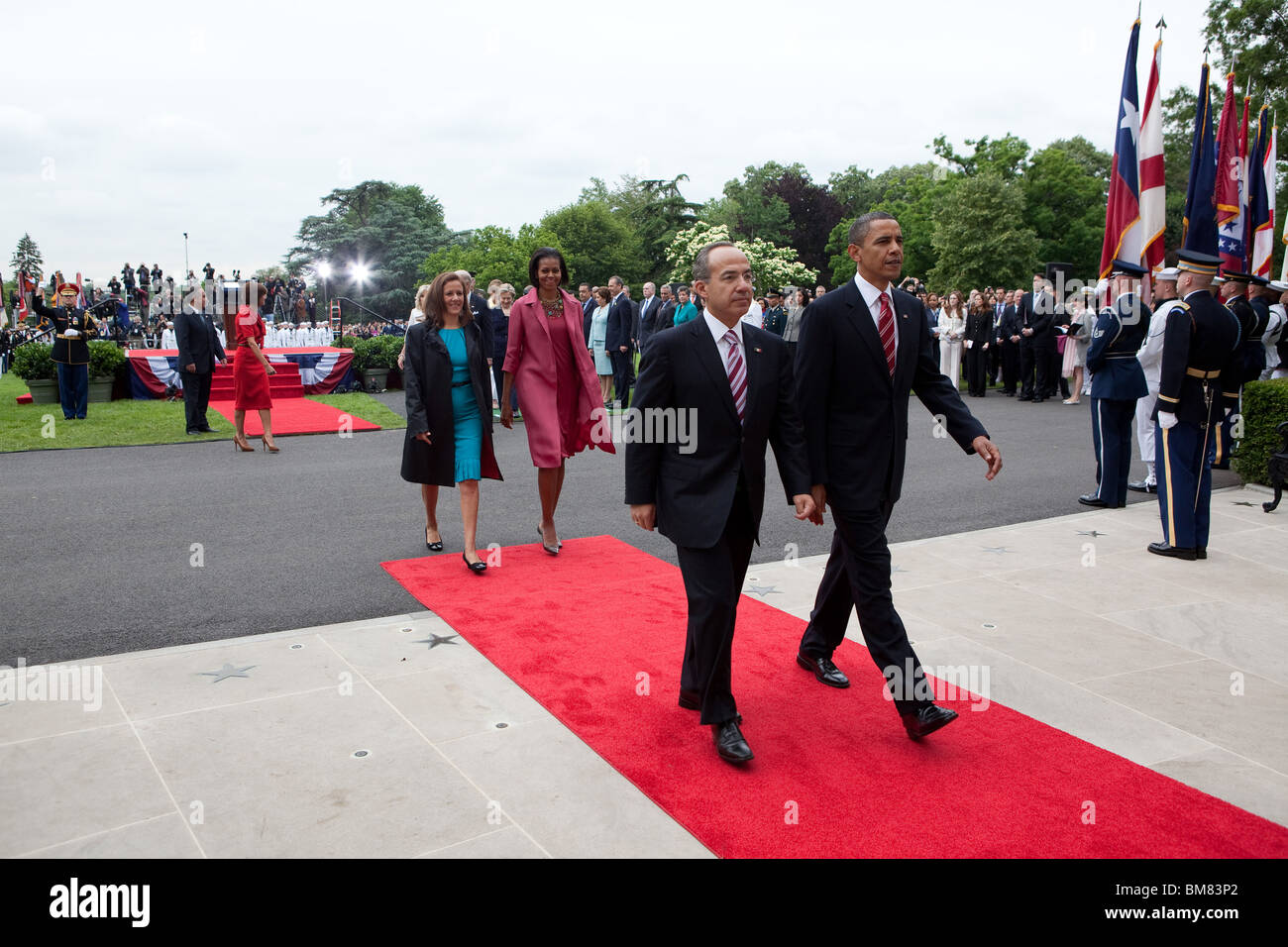 Barack and Michelle Obama walk towards the South Portico entrance of the White House with Mexican President Felipe Calderón Stock Photo