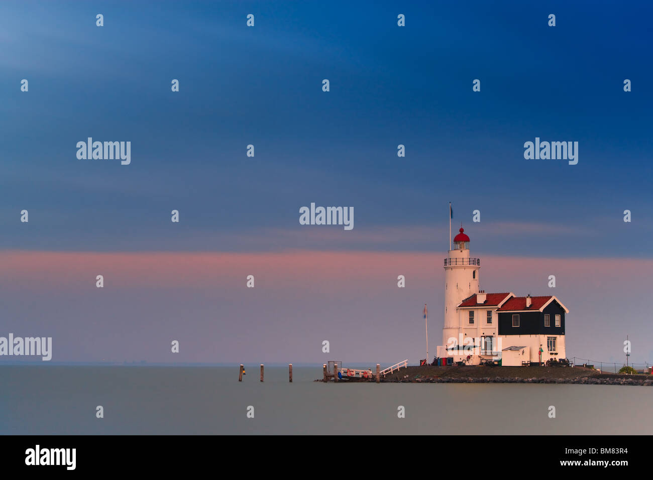 Lighthouse Paard van Marken at sunset Stock Photo