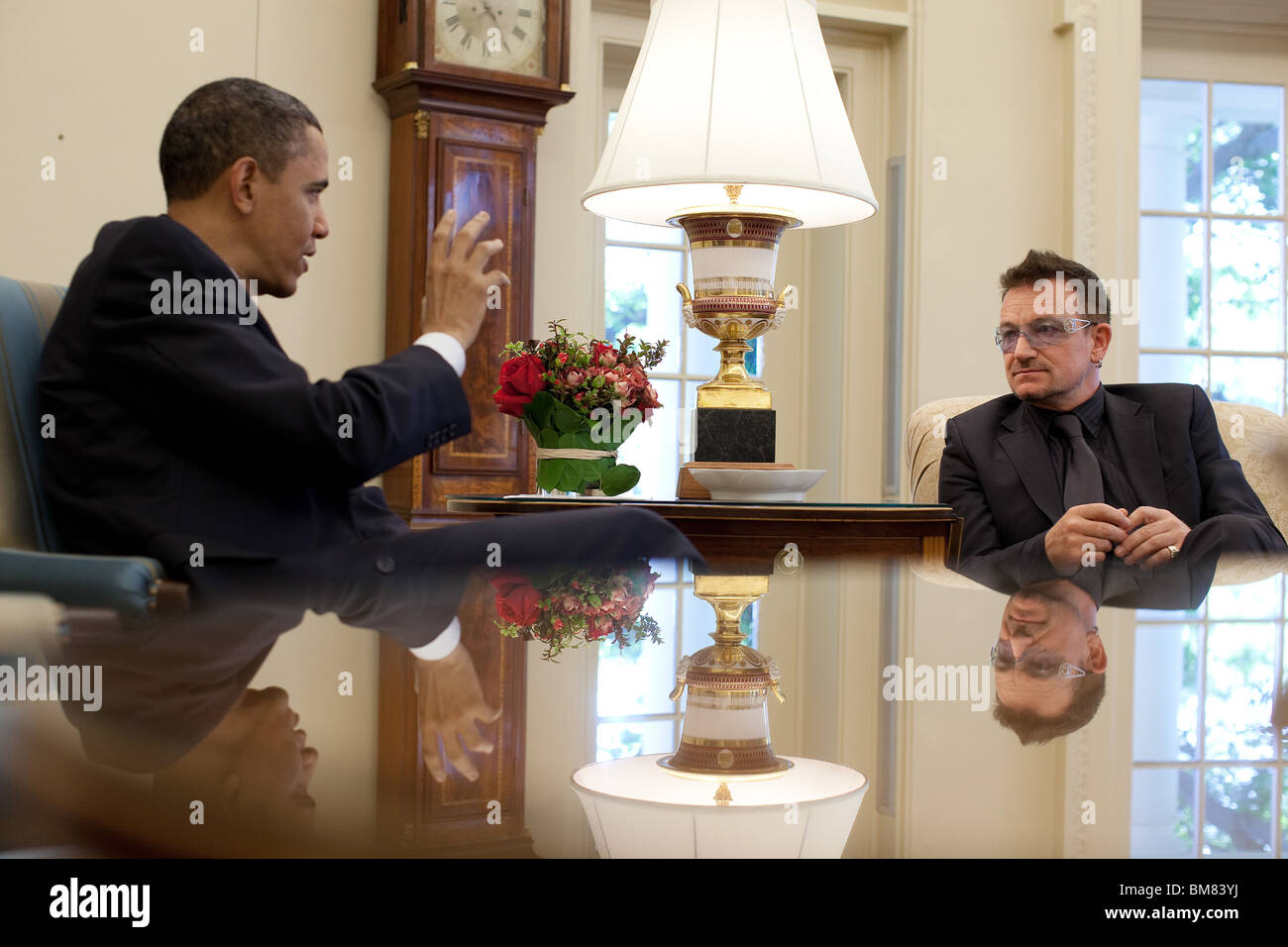 President Barack Obama meets with Paul David “Bono” Hewson, lead singer of U2 and anti-poverty activist, to discuss policy Stock Photo