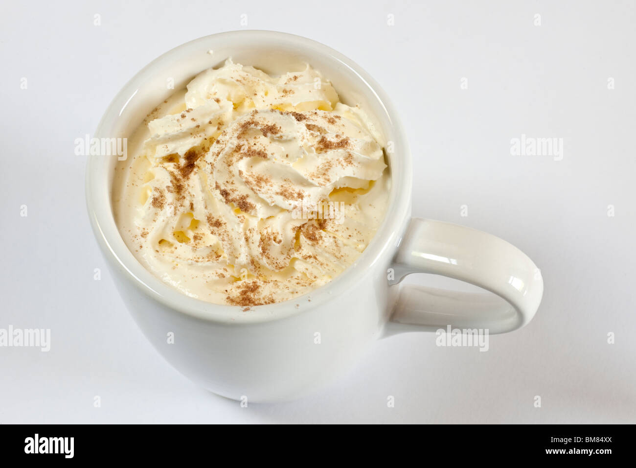Cappuccino coffee in a medium plain white mug Stock Photo