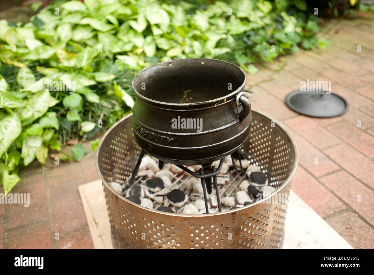 A potjiekos, or dutch oven, is used in a traditional South African